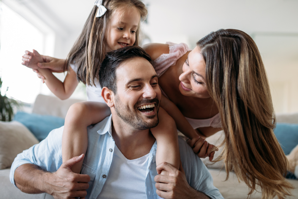 happy family after availing the special offers on dental services